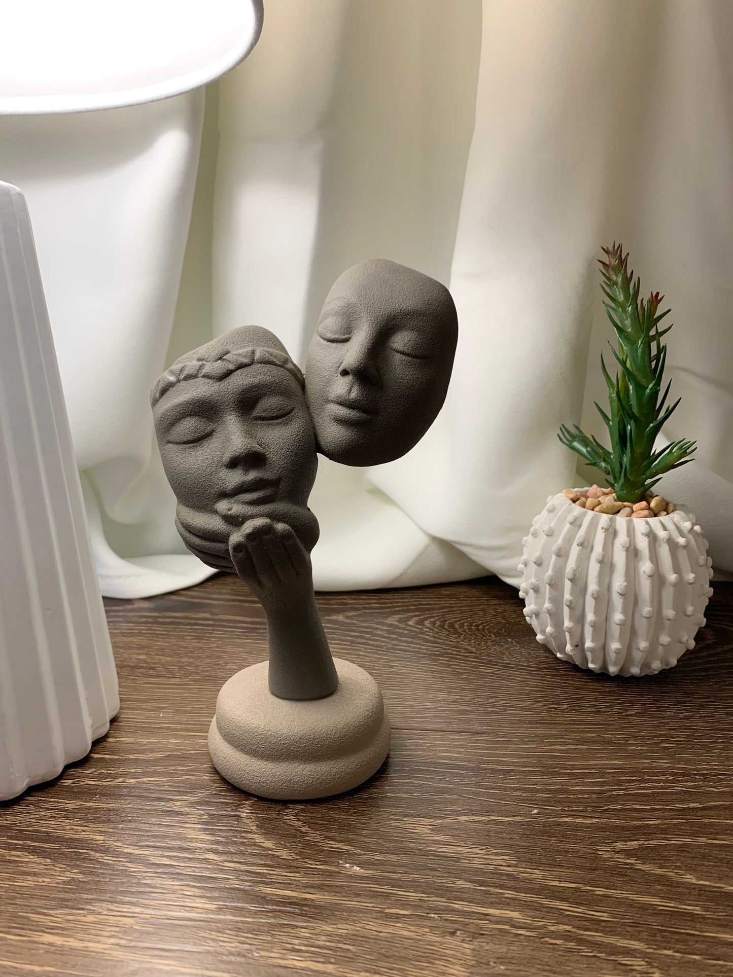 Volti in ceramica