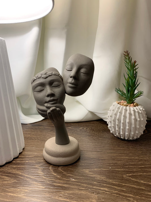 Volti in ceramica